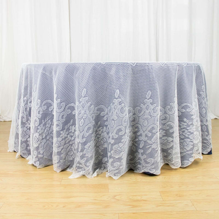 Elegant lace tablecloth in soft gray, draping beautifully over a table.