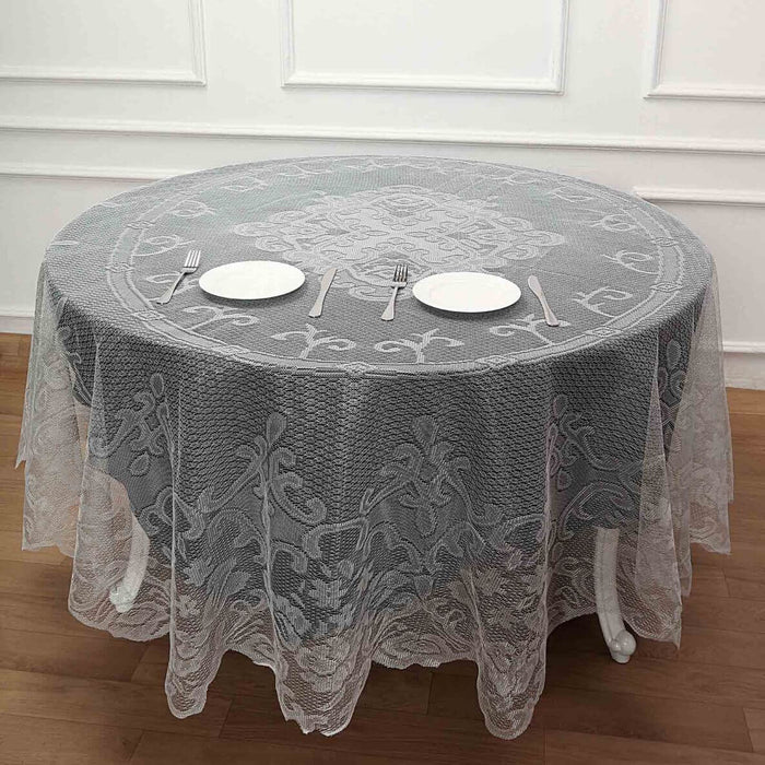 Round lace tablecloth with elegant floral pattern on a wooden table