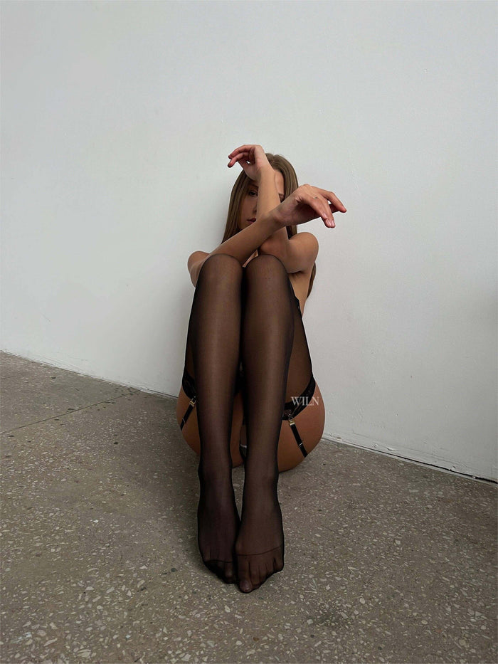 Shop lace stockings for women. Sheer, elegant tights with lace trim design—perfect finishing touch for lingerie sets and evening looks.