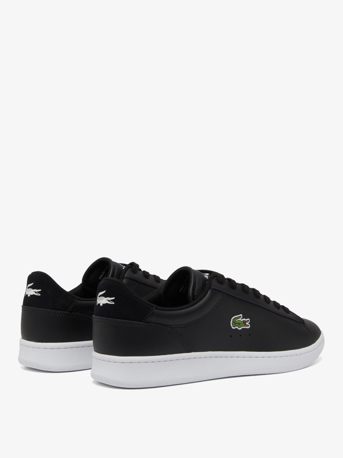 LACOSTE Carnaby Set sneakers back view showing black leather heel counter with white LACOSTE branding