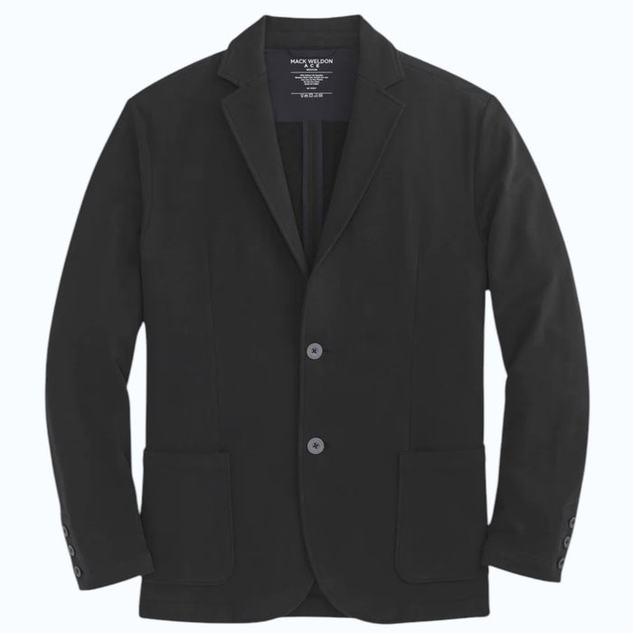 A person in a navy shirt holds open the MACK WELDON ACE BLAZER IN TRUE BLACK, revealing its comfortable, machine-washable design with an inside pocket and inner lining.