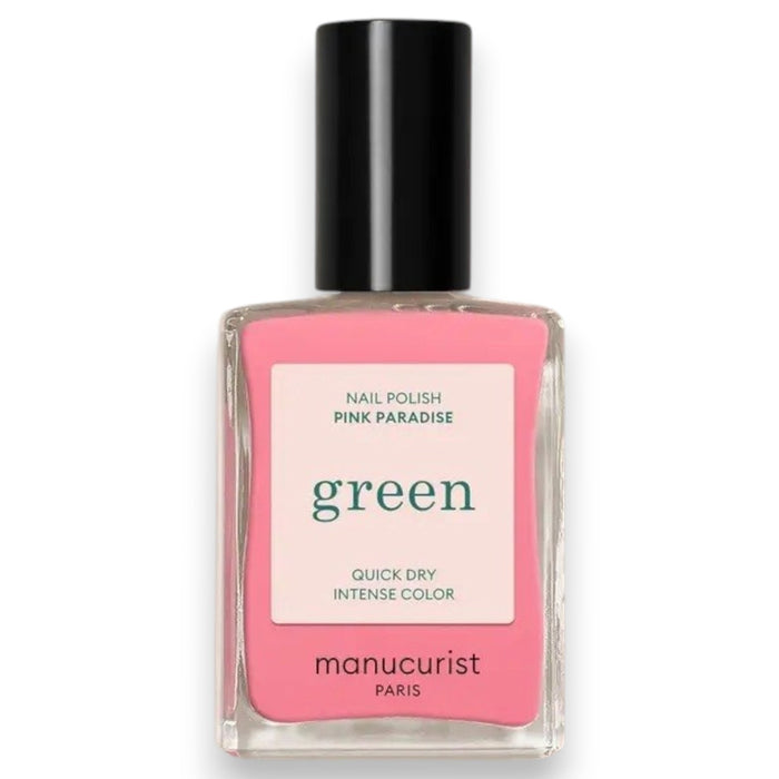 A hand with short, neatly manicured nails painted with MANUCURIST - GREEN™ Nail Polish in Pink Paradise by MANUCURIST INC rests on a cream-colored knitted fabric.