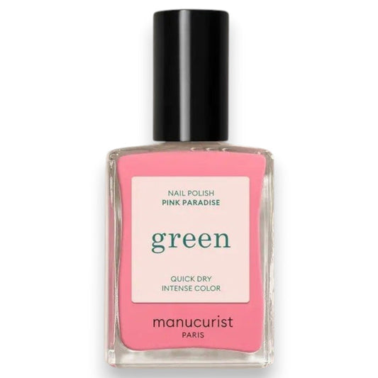 A hand with short, neatly manicured nails painted with MANUCURIST - GREEN™ Nail Polish in Pink Paradise by MANUCURIST INC rests on a cream-colored knitted fabric.