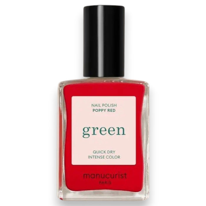 A hand with neatly manicured nails painted in MANUCURIST - GREEN™ NAIL POLISH IN POPPY RED by MANUCURIST INC rests on a brown textured fabric surface.
