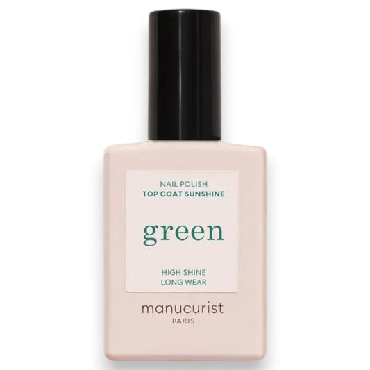 A bottle of MANUCURIST INC’s GREEN™ NAIL POLISH SUNSHINE TOP COAT, featuring “High Shine Long Wear” on the label, is shown on a white background; this plant-based top coat delivers a long-lasting manicure.