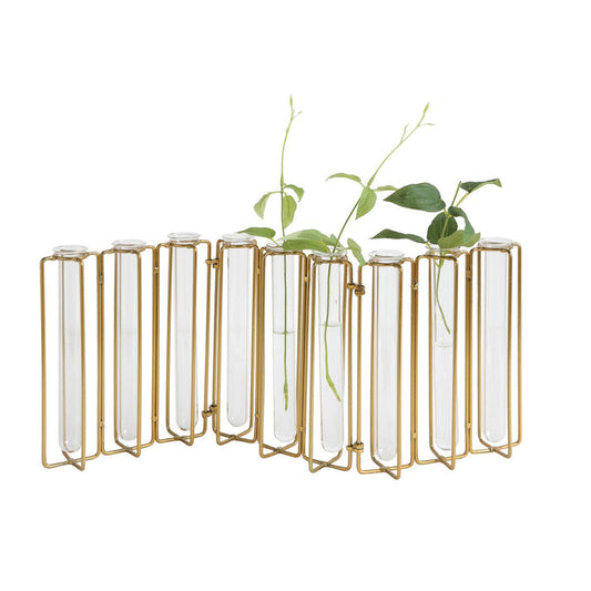 The METAL AND GLASS JOINTED VASE WITH 9 TEST TUBES by CREATIVE COOP features clear tubes in a gold metal stand, perfect for displaying green leafy stems and adding an elegant touch to your home décor.