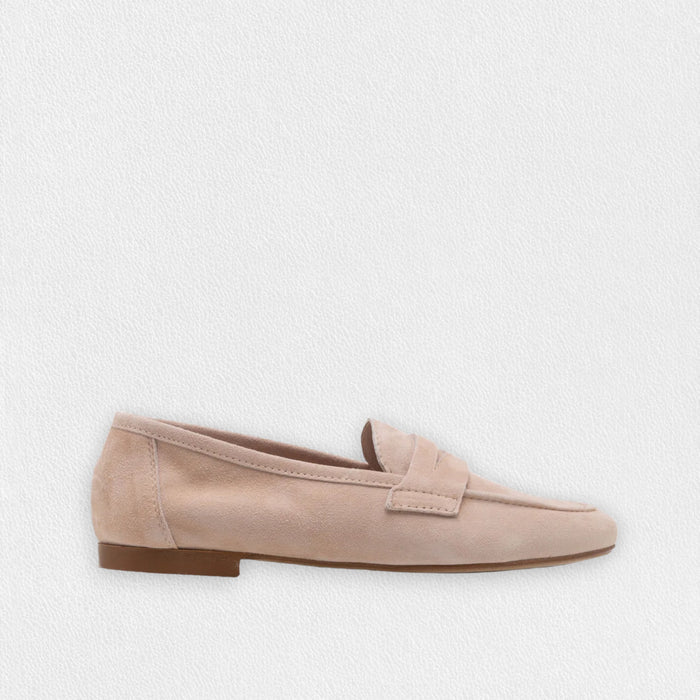 The MICHELE LOPRIORE - PAOLA SUEDE LOAFER is a light brown suede moccasin loafer with a low heel and decorative strap, displayed against a plain white textured background.