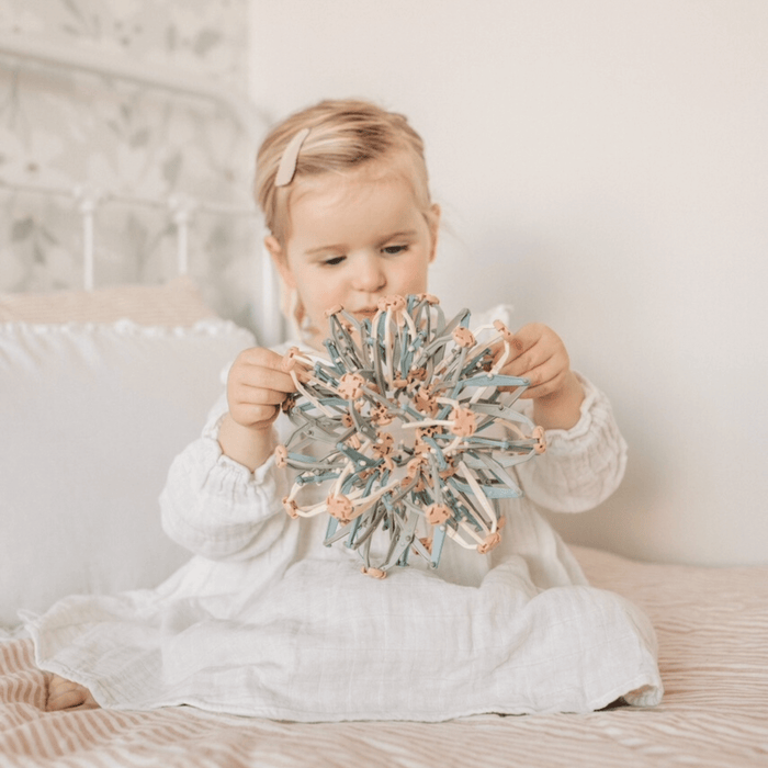 Child engaged with the Mindfulness Magic Ball, exploring mindful play and relaxation techniques.