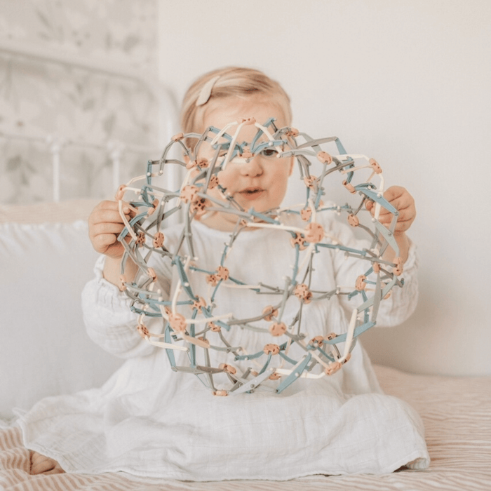 Child engaged with the Mindfulness Magic Ball, promoting mindfulness play and relaxation techniques.