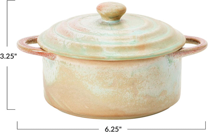 Introducing the MINI STONEWARE BAKER WITH LID by CREATIVE COOP—a rustic, round ceramic pot with side handles and a matching lid. Crafted in striking blue-green and brown hues, this mini baker features a reactive crackle glaze for distinctive texture. The lid is topped with an easy-to-grip knob handle, making it ideal for serving individual casseroles in style.