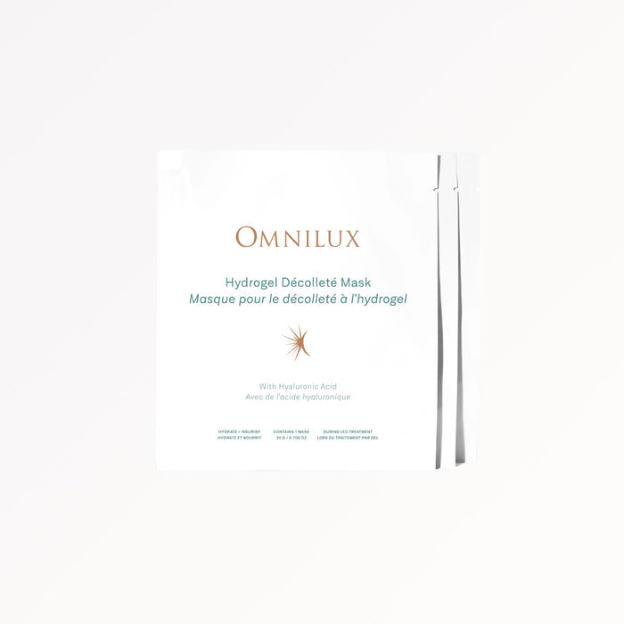 A woman smooths OMNILUX Hydrogel Décolleté Mask onto her shoulder, elevating her skincare routine with this advanced treatment from OMNILUX. The formula features standout ingredients—hyaluronic acid for deep hydration, niacinamide to refine skin texture, and green tea extract for soothing care and antioxidant protection. For amplified results, pair with OMNILUX LED treatments to further enhance the rejuvenating effects.