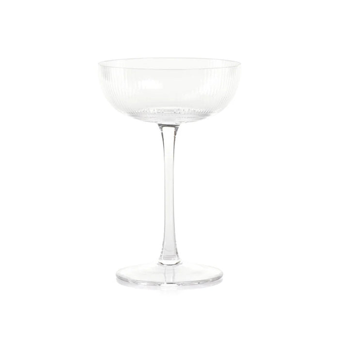 The ZODAX OPTIC DESIGN MARTINI GLASS, with its wide, shallow bowl and slender stem, stands upright against a white background—ideal for modern bars or as an elegant martini glass alternative.