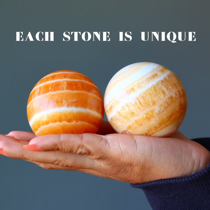 two orange calcite spheres