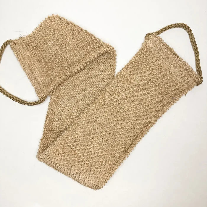 Beige woven bag on a white background