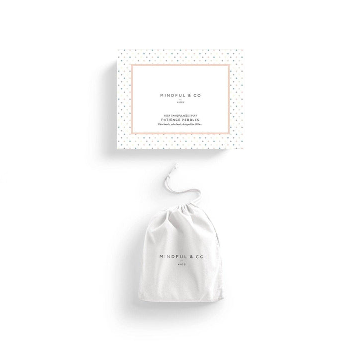 White drawstring bag and packaging box with 'Mindful & Co' branding on a white background