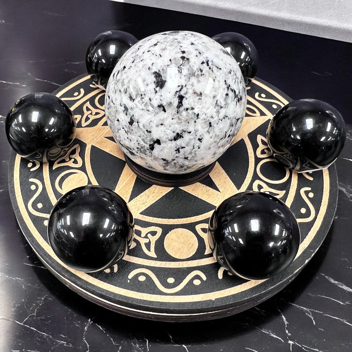 Wooden crystal grid with pentacle and filigree design, 6 small and 1 large hole for crystals – Raven’s Cauldron, 6 N Sandusky St, Delaware, OH 43015