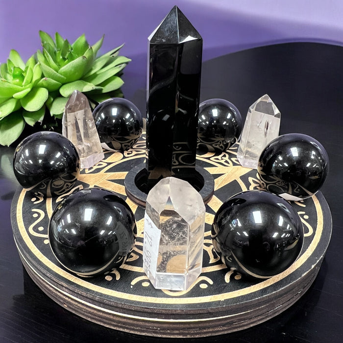 Wooden crystal grid with pentacle and filigree design, 6 small and 1 large hole for crystals – Raven’s Cauldron, 6 N Sandusky St, Delaware, OH 43015