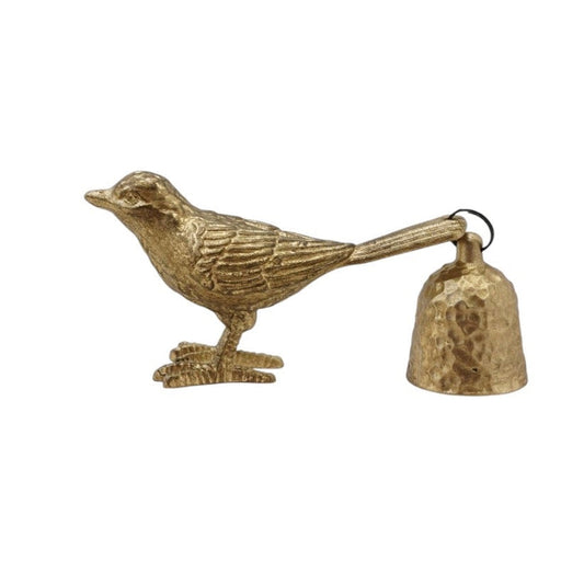 The CREATIVE COOP PEWTER BIRD-SHAPED CANDLE SNUFFER in antique gold finish features a textured, shiny design with a hammered metal bell attached to its tail, standing on two legs for an eye-catching display.