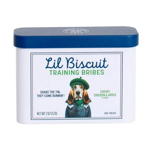 A rectangular, refillable tin labeled "PIPER LOOP PETS - LIL BISCUIT TRAINING BRIBES, CHEWY CHICKEN & APPLE," with a dog in a green sweater—chewy USA-sourced dog treats. Shake the tin, they come running!.