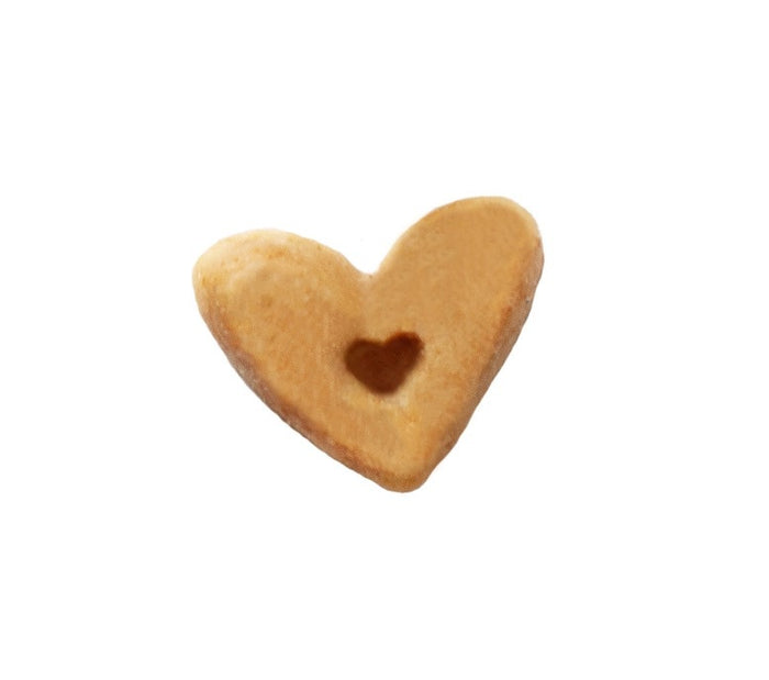 A rectangular, refillable tin labeled "PIPER LOOP PETS - LIL BISCUIT TRAINING BRIBES, CHEWY CHICKEN & APPLE," with a dog in a green sweater—chewy USA-sourced dog treats. Shake the tin, they come running!.