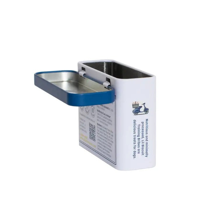 The rectangular, refillable Piper Loop Pets tin labeled “Lil Biscuit Training Bribes” features a pug illustration and holds chewy peanut butter & carob dog treats made from USA-sourced ingredients.