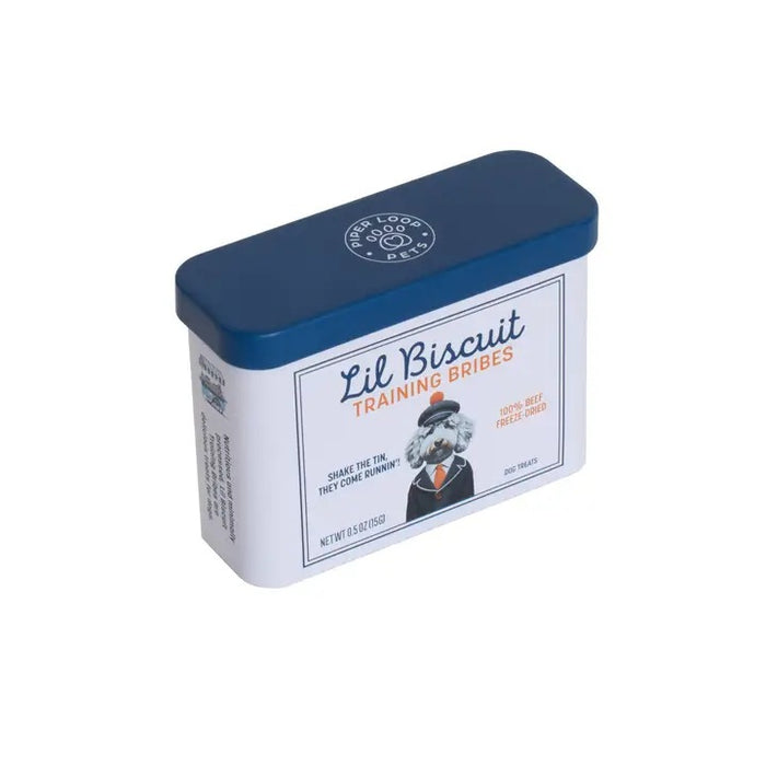 The rectangular PIPER LOOP PETS Lil Biscuit Training Bribes tin features a suited dog illustration and contains 100% freeze-dried beef treats—ideal as high-value bribes for recall or daily training with your pup.