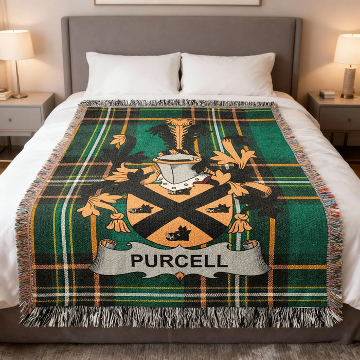 Purcell Irish family crest woven blanket displayed on a bed.