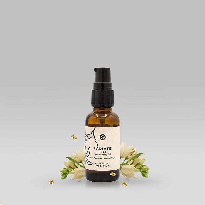 Brown spray bottle with a label on a gray background