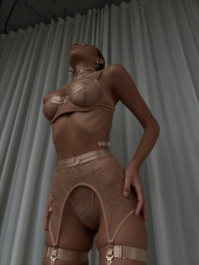 RAVENOUS 4 Piece Lace Lingerie Set displayed on a model, showcasing elegant lace details and a flattering fit.