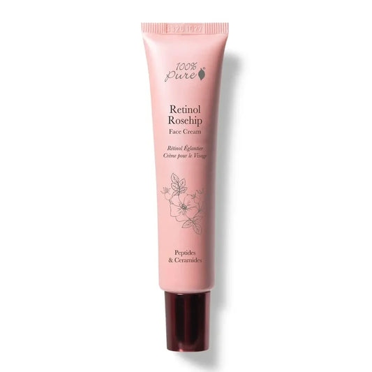 Pink tube of Retinol Roschip Face Cream on a white background