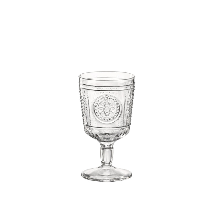 A clear glass with a Victorian-inspired design, featuring intricate embossed patterns and a wide mouth.