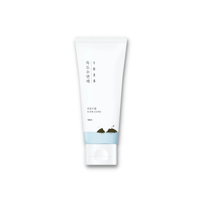 ROUND LAB 1025 Dokdo Sleeping Pack is a nourishing overnight mask designed to deeply hydrate and rejuvenate the skin while you sleep. Infused with Sea Water and Panthenol, it helps to lock in moisture and soothe the skin. The formula includes Hydrogenated Polydecene and Lactobionic Acid, which work together to smooth and refine skin texture. This sleeping pack provides a protective barrier, leaving your skin feeling refreshed, hydrated, and revitalized by morning. Ideal for achieving a radiant a