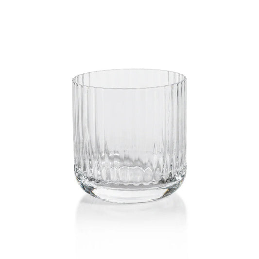 The SAVOY DOUBLE OLD FASHIONED GLASS by ZODAX, featuring clear ribbed glass with vertical ridges, sits on a white background and casts a soft reflection below.