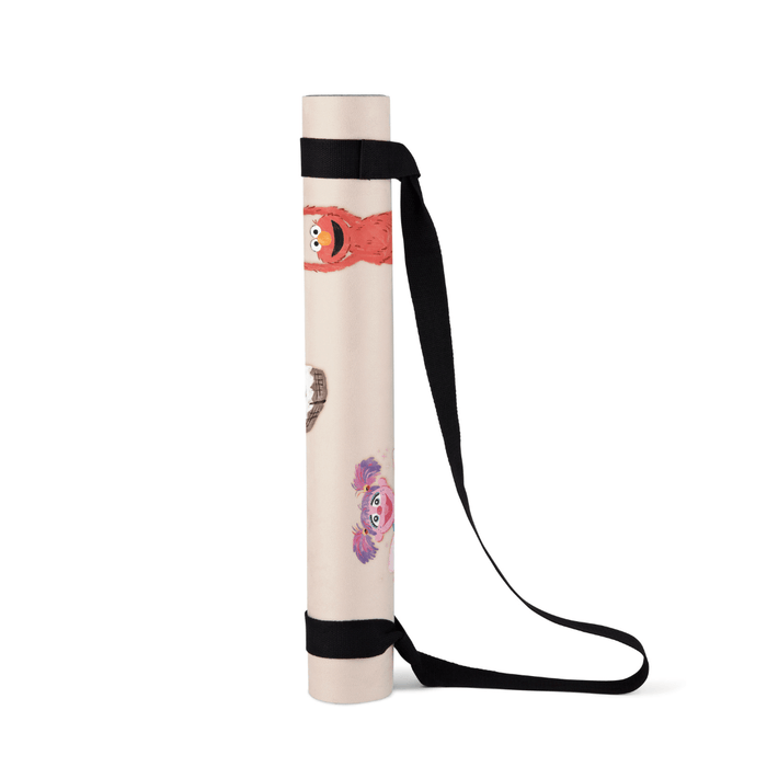 Sesame Street Print Kids Yoga Mat rolled up with colorful character designs, perfect for child-friendly yoga sessions.