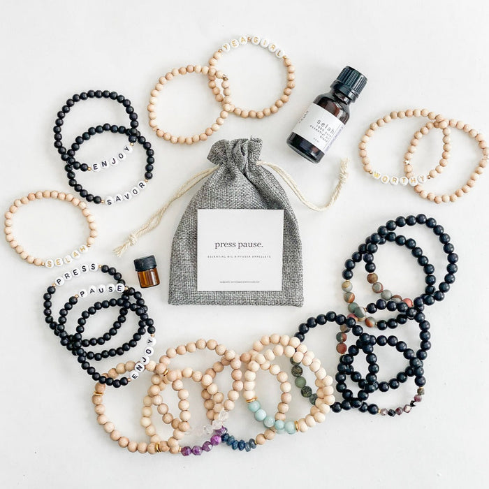 Set of 2 Press Pause Bracelets in Black: "Press Pause"