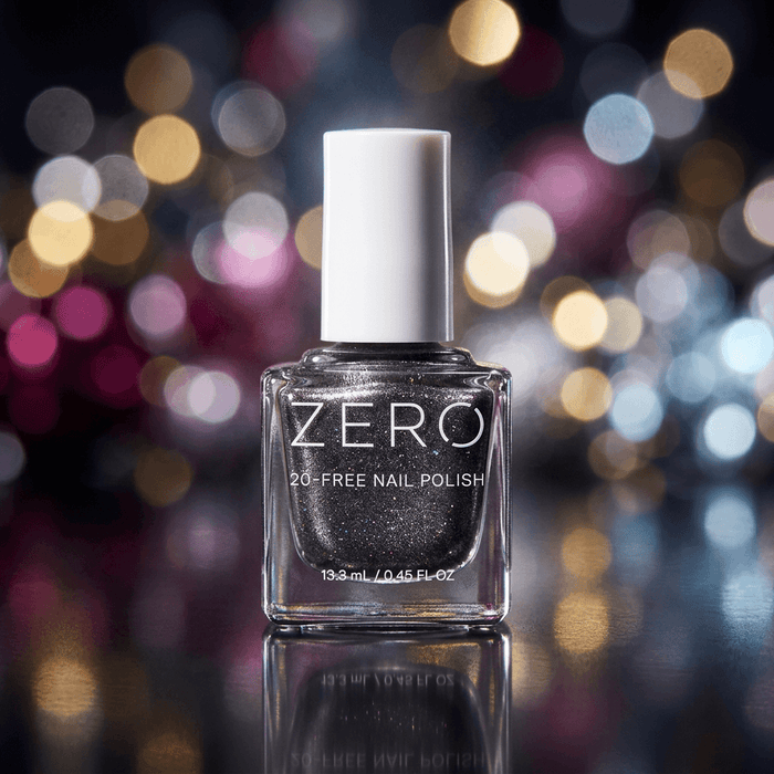 Bottle of ZERO 20-Free Nail Polish with a blurred colorful background