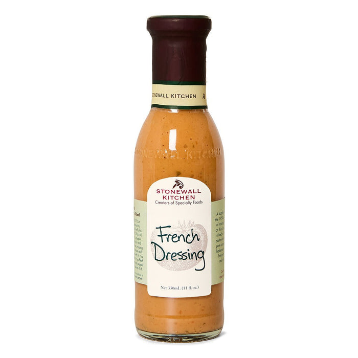 A bottle of STONEWALL KITCHEN - FRENCH DRESSING features a maroon cap and a cream-colored label with the product name and volume, delivering the classic, zesty tang of traditional French dressing to your table.