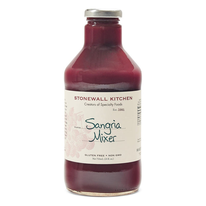 A glass bottle of STONEWALL KITCHEN - SANGRIA MIXER from STONEWALL KITCHEN features a maroon liquid, is labeled as gluten free and non-GMO, and has a metal cap with a cream-colored label displaying product details. Ideal for making fruity drinks or party cocktails.
