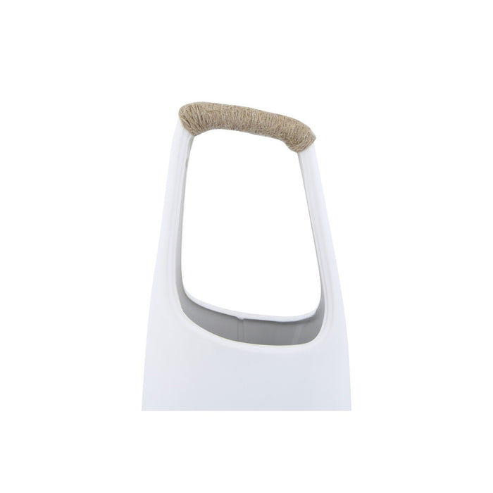 The CREATIVE COOP STONEWARE VASE WITH RATTAN WRAPPED HANDLE in white features a tall, minimalist design with a narrow neck and a rattan-wrapped handle, making it a striking decorative accent for any space.