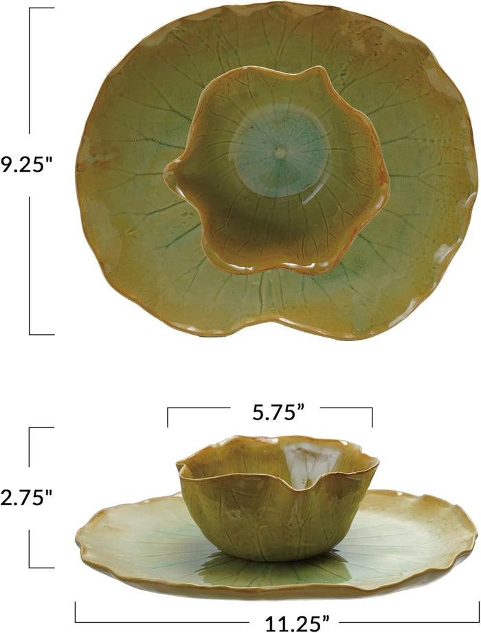 The CREATIVE COOP STONEWARE WATER LILY PLATE WITH BOWL IN REACTIVE CRACKLE GLAZE features veined, green leaf shapes and wavy edges, resembling natural leaves from the side view.