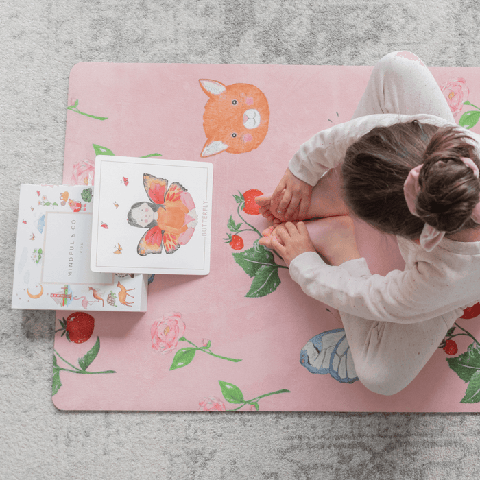 Sweet Print Kids Yoga Mat featuring charming animal and butterfly illustrations with a child practicing yoga.
