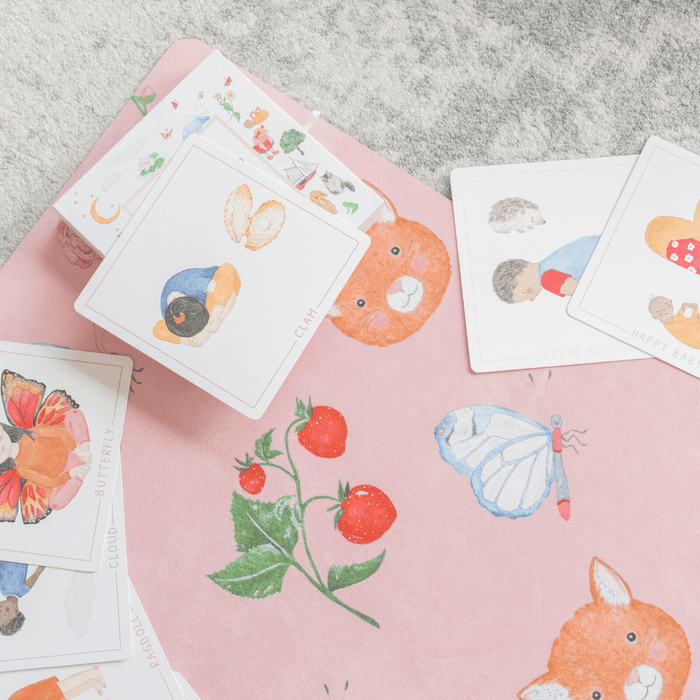 Sweet Print Kids Yoga Mat with colorful animal illustrations and cards for mindfulness and play.