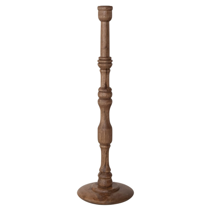 The CREATIVE COOP TURNED MANGO WOOD TAPER HOLDER, LARGE, is a wooden candlestick holder featuring traditional turned woodwork, carved details, and a round base, shown upright on a white background.