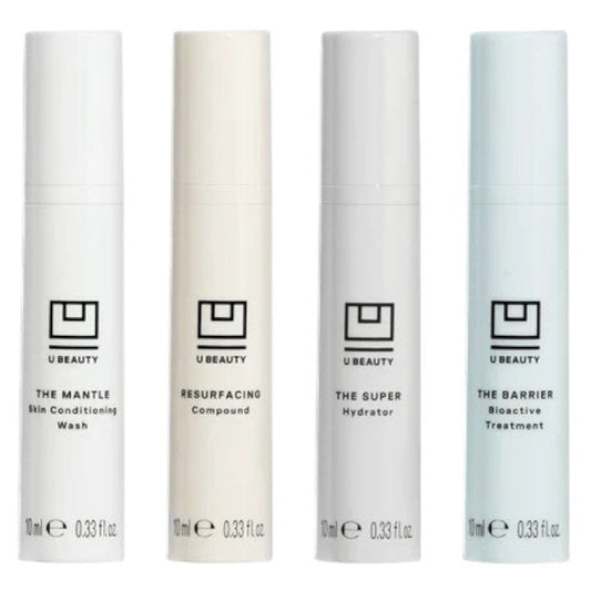 THE INDEX SET VOL II 10ML by U BEAUTY includes four 10ml skincare essentials—The Mantle, Resurfacing Compound, SUPER Hydrator, and The Barrier—in sleek white travel-friendly bottles for easy skincare on the go.