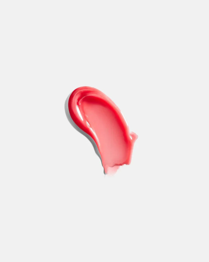 A 15ml tube of U BEAUTY THE PLASMA LIP COMPOUND, featuring white text and logo on the front, is shown upright on a white background.