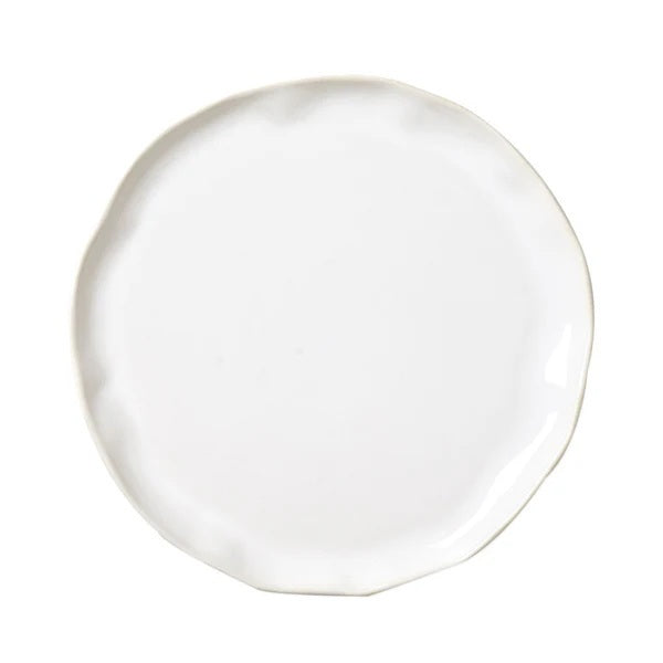 The VIETRI - FORMA CLOUD DINNER PLATE by VIETRI is a handcrafted white stoneware plate with subtly wavy, uneven edges, shown from above against a white background.