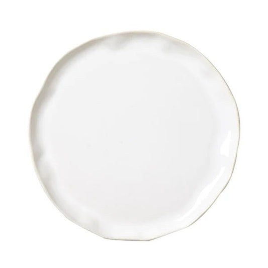 The VIETRI - FORMA CLOUD DINNER PLATE by VIETRI is a handcrafted white stoneware plate with subtly wavy, uneven edges, shown from above against a white background.