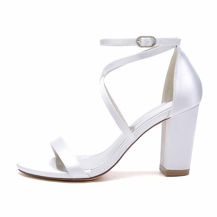 White women's chunky heel ankle strap sandals with a stylish design for elegant occasions
