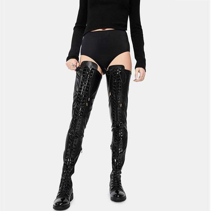 Stylish women's over the knee lace up boots in black, featuring a bold lace-up design and sleek finish