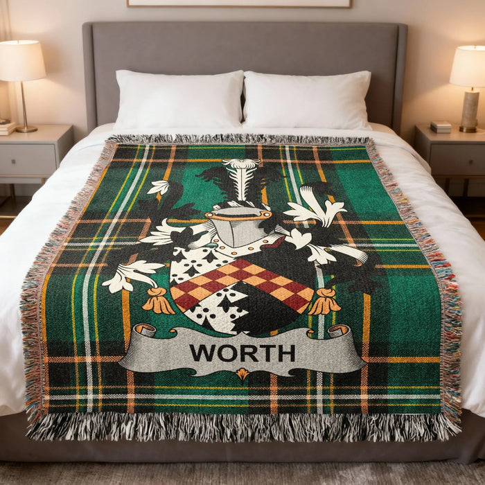 Worth Irish family crest woven blanket displayed on a bed.